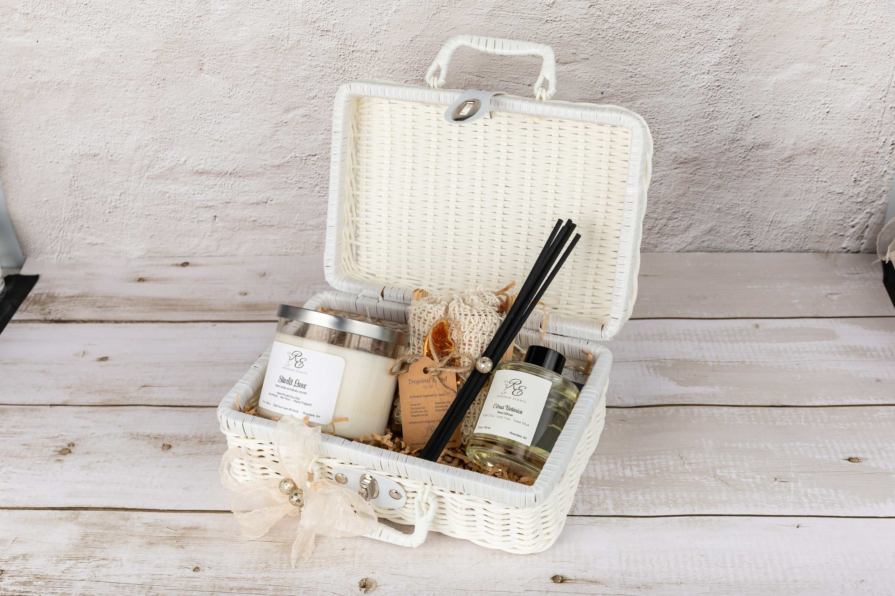 wellness gift set with candle soap kit reed diffuser in rattan suitcase
