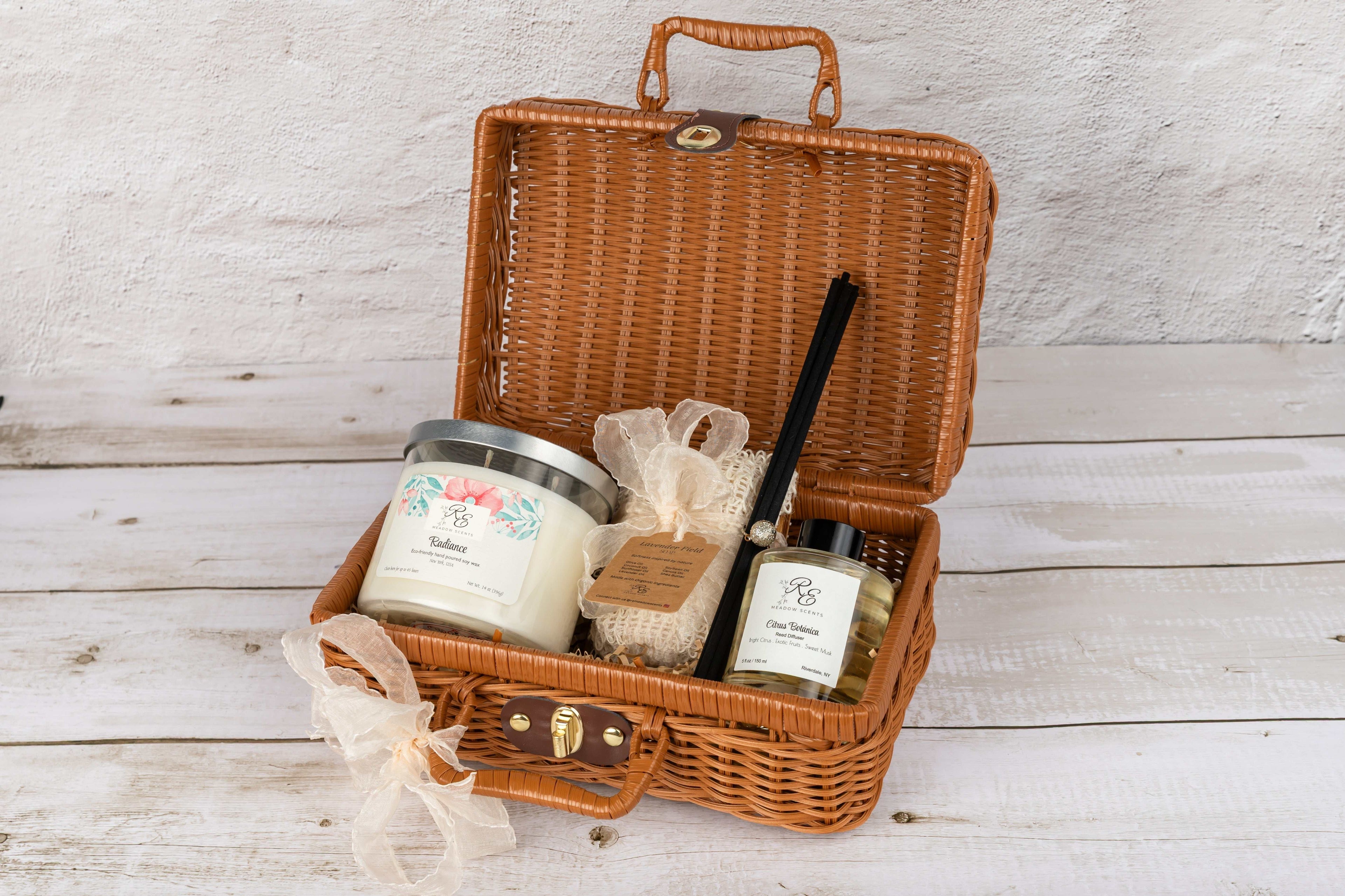 Keepsake wellness set with rattan suitcase, candle, soap kit, and reed diffuser