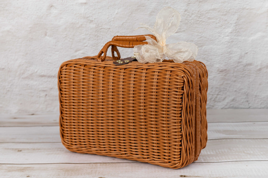 Wellness set with rattan suitcase, scented candle, soap kit, and reed diffuser