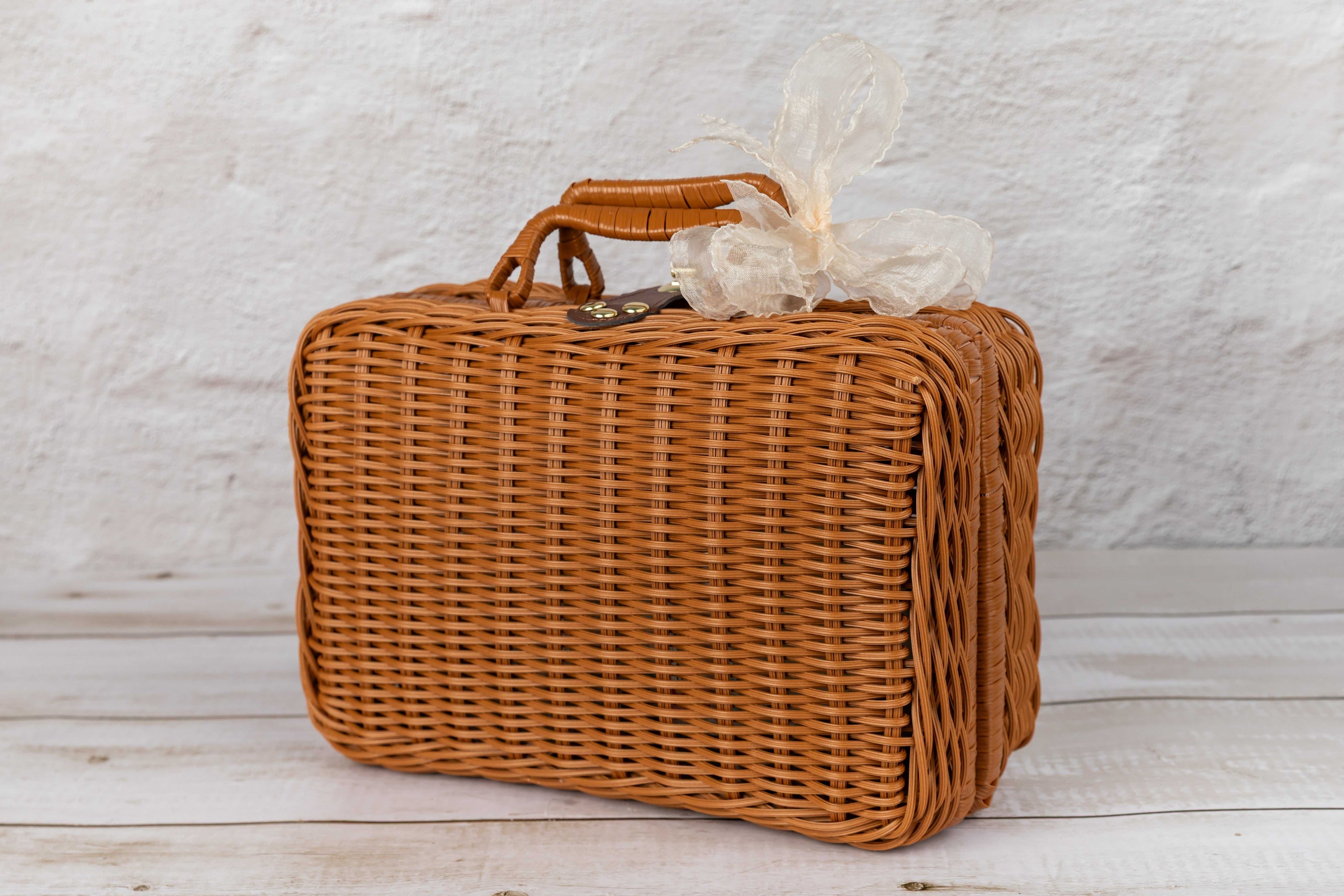 Wellness set with rattan suitcase, scented candle, soap kit, and reed diffuser